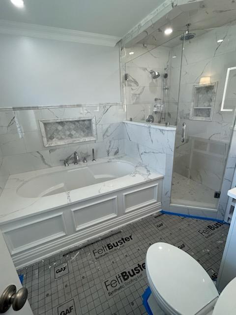 New City, NY Bathroom gut renovation. Installation of tile, tub niche, vanity, faucets, moulding, trim, mirror, sheetrock, painting