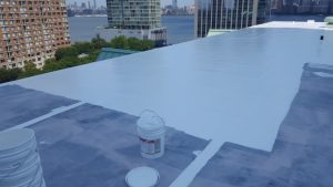 Candlewood Suites Jersey City, N.J. EPDM roof restoration August 2017 in progress with GACO S2000 Liquid Silicone System. 20 year NDL warranty.
